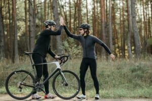 Two people high fiving